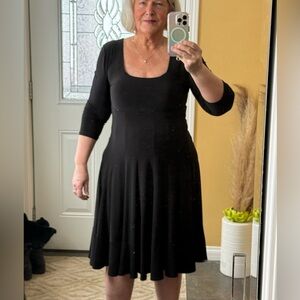 Joseph Ribkoff fit and flare black dress.